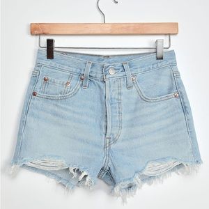 Levi’s 501 Distressed Shorts in light wash